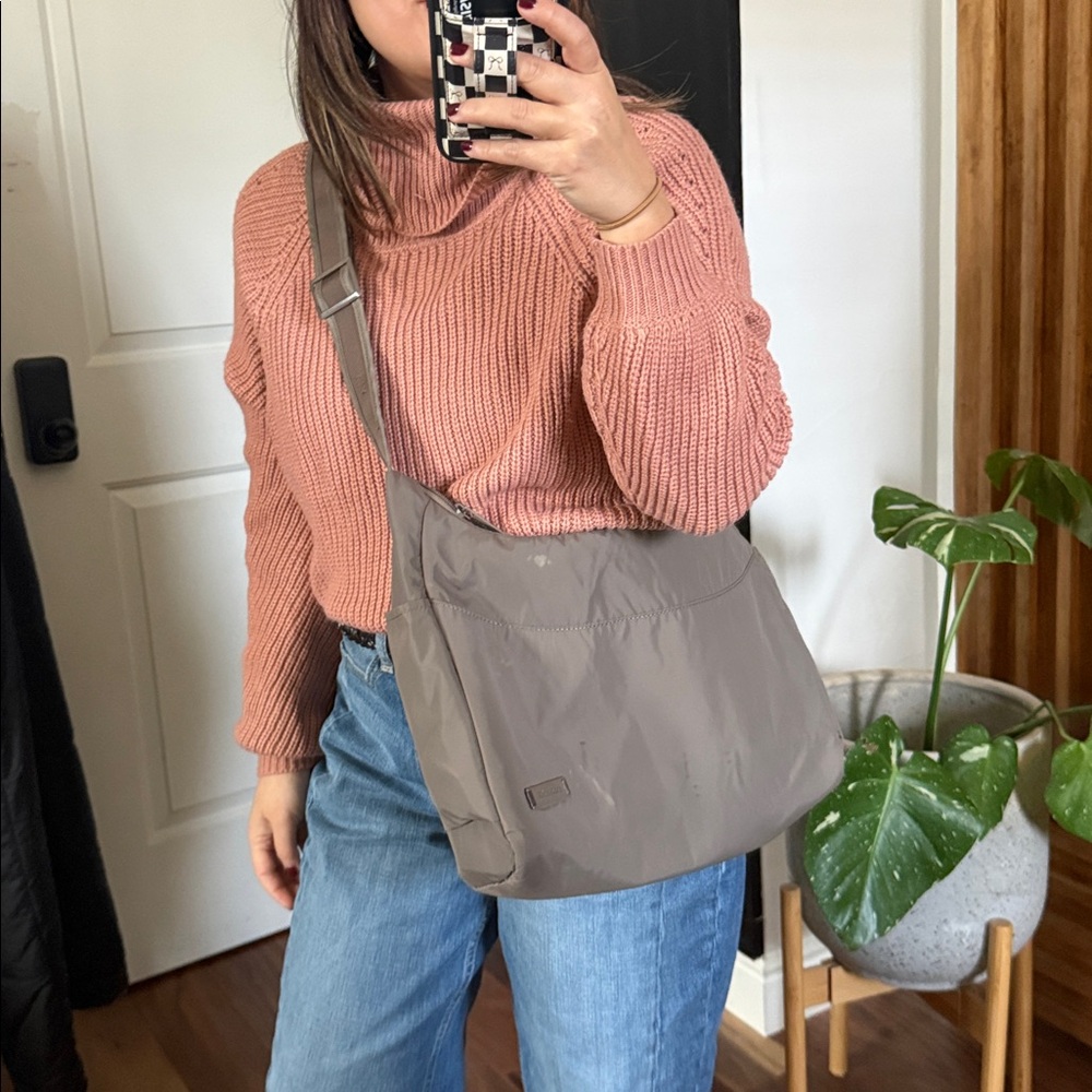 PACSAFE Citysafe Antitheft All Day Crossbody Hobo. See measurements